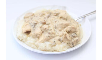 A plate of Amish Chicken (from the Instant Pot Amish Chicken Recipe from 365 Days of Slow Cooking): Features a plate of white stew over mashed potatoes.