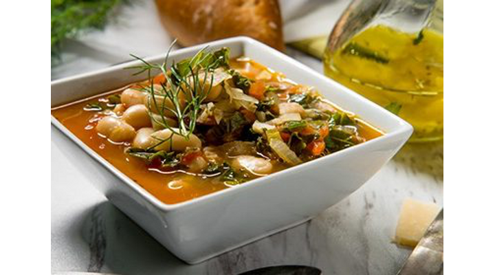 A square bowl of Tuscan White Bean and Lentil Soup